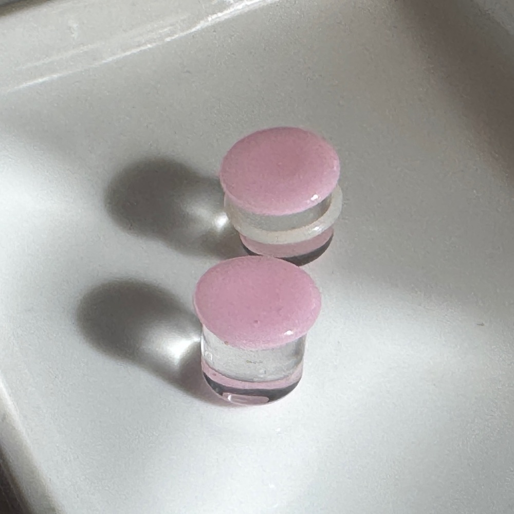 Pink and Clear Round Plugs